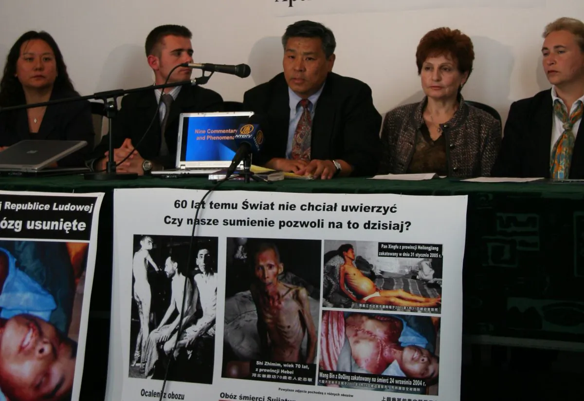 AUSCHWITZ: Professor Sen Nieh, surrounded by three panelists and panel moderator, speaks at the "Never Again: Appeal to the World" forum discussing illegal organ harvesting in death camps in China, held in Auschwitz, Poland on May 9, 2006. (Jan Jekielek/The Epoch Times)