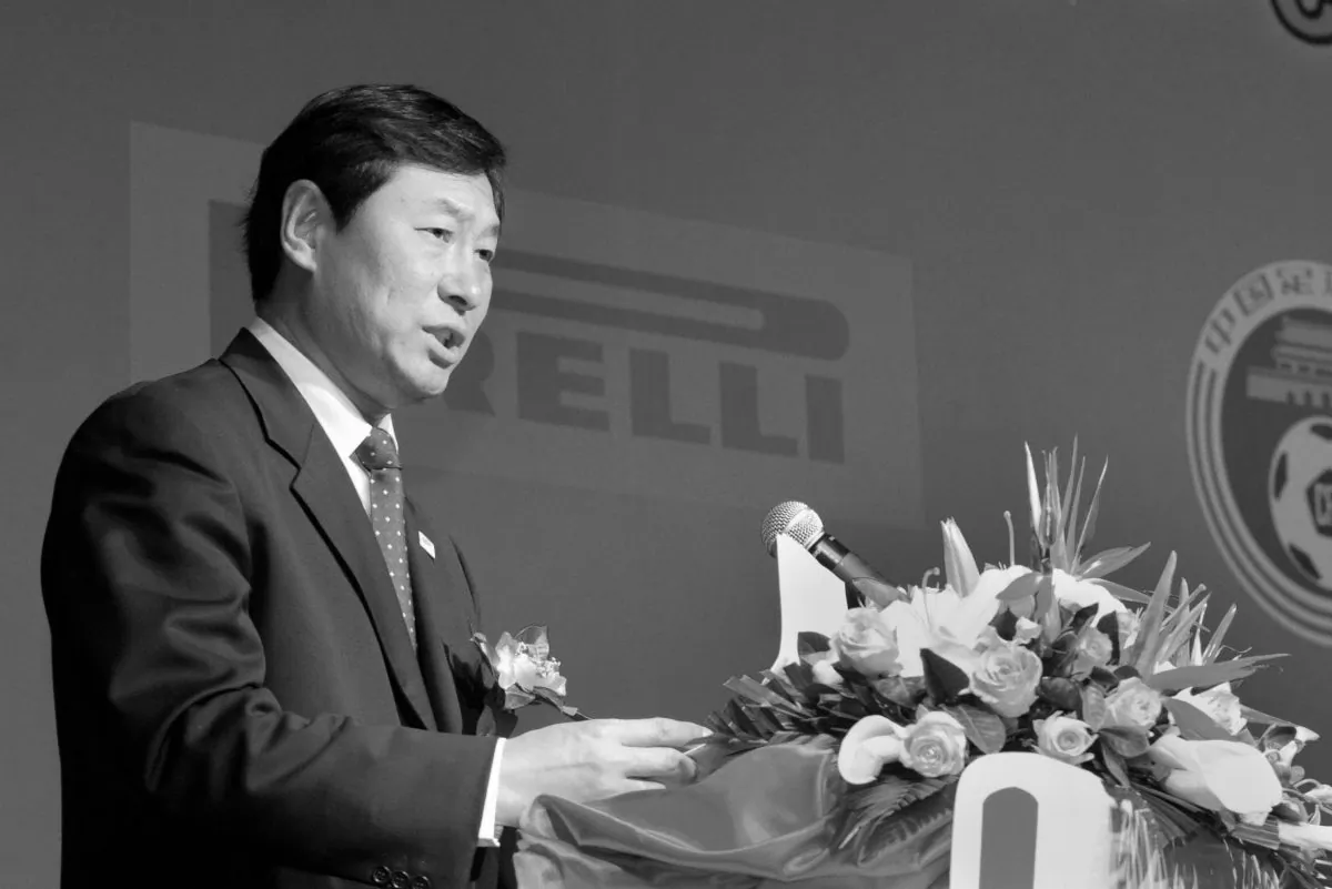 Nan Yong, vice president of China Football Association speaks during the sponsorship signing ceremony of 2009 Chinese Football Association Super League in Beijing on March 20, 2009. China kicks off the new season on March 21 with a new title sponsor, a renewed television contract and judicial oversight aimed at weeding out persistent graft and match-fixing. The Chinese Super League includes 16 teams that will play 30 matches between March and November. AFP PHOTO / LIU Jin (Photo credit should read LIU JIN/AFP/Getty Images)