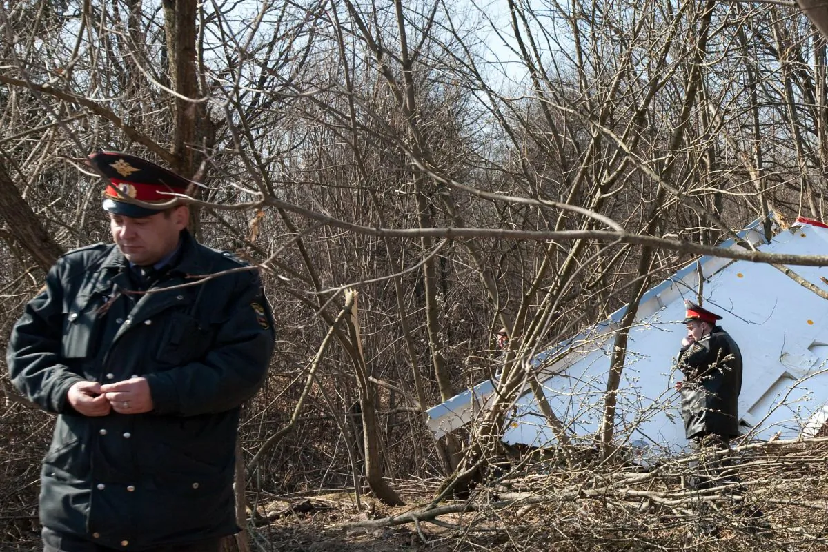 Russian policemen walk near the wreckage of a Polish government Tupolev Tu-154 aircraft that crashed near Smolensk airport on April 10. (Maxim Malinovsky/AFP/Getty Images)