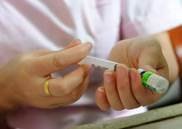 Nurse preparing a vaccination shot at the local disease control and prevention center in Jiujiang in China's central Jiangxi province, on July 24, 2018. (AFP/Getty Images)