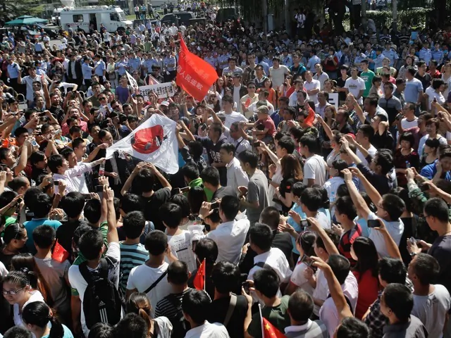 Chinese protestors stage an anti Japan rally outside the Japan Embassy on Sept. 15, 2012 in Beijing. A number of Japanese companies have announced plans to close shop, at least temporarily, as anti-Japan sentiment flares. (Lintao Zhang/Getty Images) 