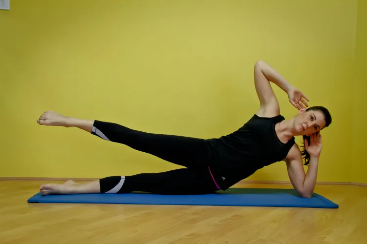 The side kick with balance will challenge your thighs, core, and balance. (Jocelyn Bong)