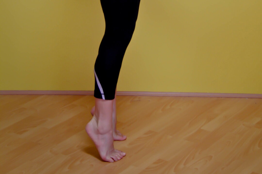Standing heel raises strengthen the calf muscles as well as improve balance. (Jocelyn Bong)