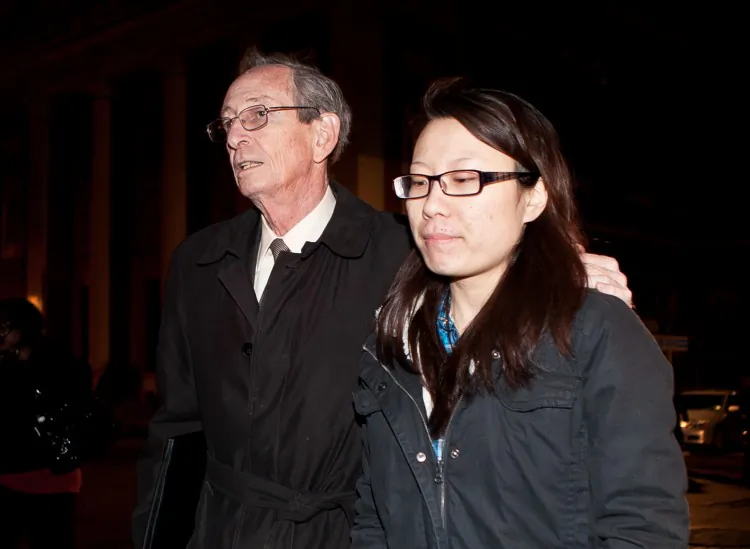 Jia "Jenny" Hou (R) with her lawyer Martin B. Adelman leaving Manhattan Federal Court in early 2012. Hou, John Liu's campaign treasurer, is facing charges of fraud and obstruction of justice in connection with Liu's 2013 election campaign. (Amal Chen/The Epoch Times)