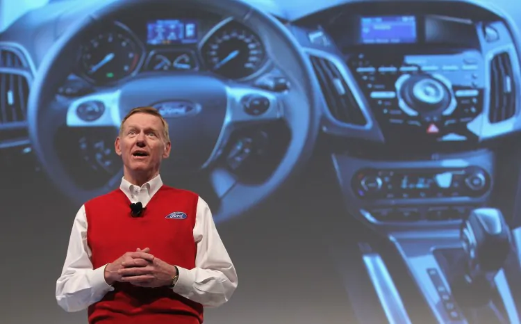 In this photo from 2011, Alan Mulally, CEO of Ford Motor Co., presents the new Ford Sync automotive mobile communications system at the CeBIT technology trade fair in Hanover, Germany. In-car communication devices will be a new platform for marketing in the near future. (Sean Gallup/Getty Images)