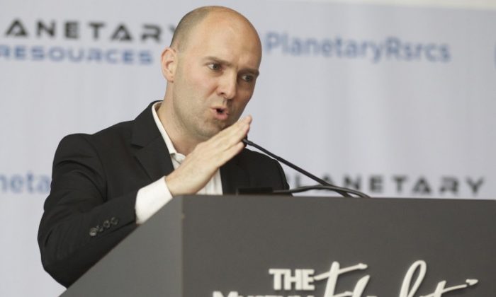 Planetary Resources, Inc., Co-Founder and Co-Chairman Eric Anderson speaks during a press conference announcing plans to mine asteroids. (Stephen Brashear/Getty Images)