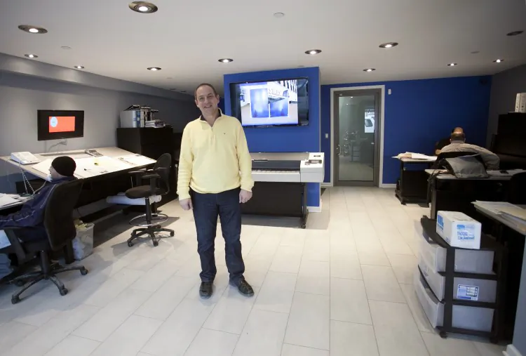 Sergi at his company's office in Red Hook, which he had to remodel after damage from Sandy. (Deborah Yun/Epoch Times)