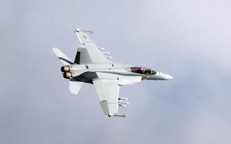 An F-22 fighter plane takes off at the Farnborough Airshow in Farnborough, England, on July 20, 2010. (Dan Kitwood/Getty Images)
