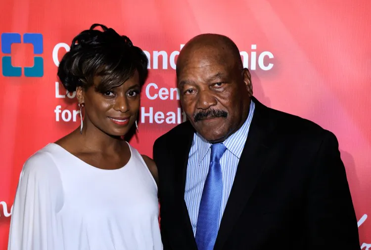 Former football player Jim Brown (R) and wife Monique Brown (Ethan Miller/Getty Images)