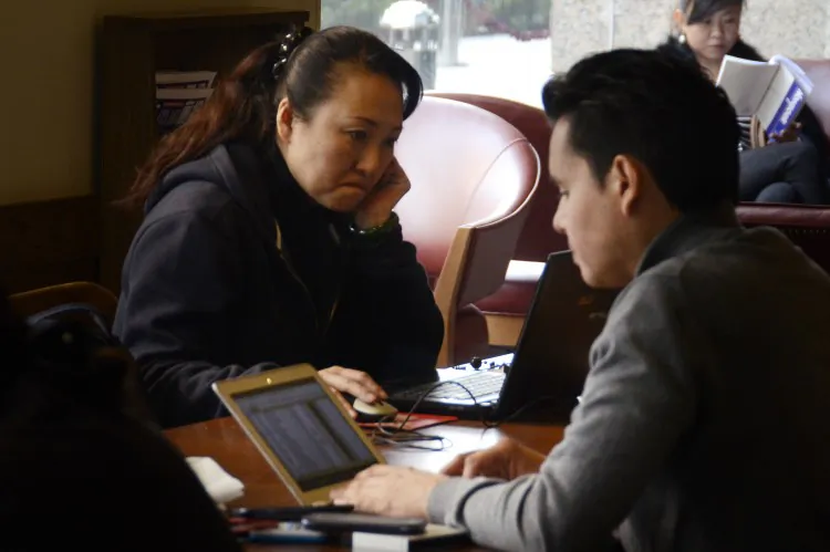 Chinese people use their laptop computers at a cafe in Beijing on Nov. 2, 2012. (Wang Zhao/AFP/Getty Images)
