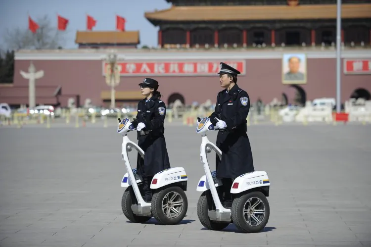 Police patrol on Tiananmen Square in Beijing on March 4, 2013 during major political meetings in Beijing. Dissidents around the country have been put under arrest, while the regime has let forth a flood of propaganda about the "Two Meetings." (Wang Zhao/AFP/Getty Images)