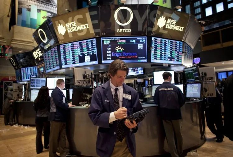 Traders work on the floor of the New York Stock Exchange in New York City, on March 14, 2013. (Allison Joyce/Getty Images)