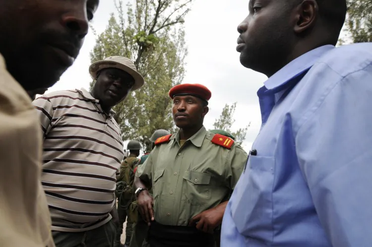 General Bosco Ntaganda (R) stands with fellow officers on January 24, 2009 in Rutshuru, DR Congo, 45 miles (75kms) north of the provincial capital Goma. (Lionel Healing/AFP/Getty Images)