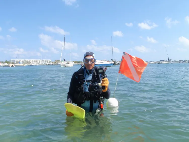Author and photographer John Christopher Fine with SeaLife 1400 digital camera and external strobe. (John Christopher Fine copyright 2013)