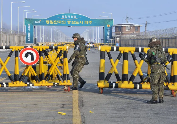 South Korean soldiers set up barricades across the road to North Korea's Kaesong Industrial Complex Feb. 13. North Korea threatened to shut down the economically important complex March 30. (Jung Yeon-Je/AFP/Getty Images)