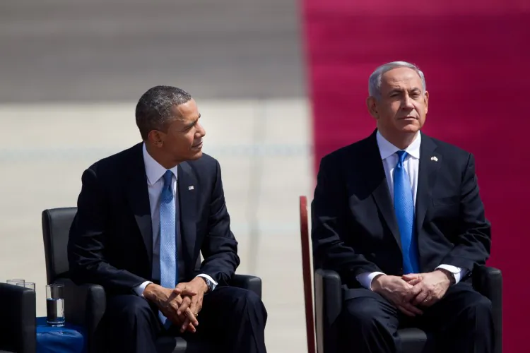 U.S. President Barack Obama (L) sits with Israeli Prime Minister Benjamin Netanyahu (R) during an official welcoming ceremony on his arrival at Ben Gurion International Airport on March, 20, 2013, near Tel Aviv, Israel. (Uriel Sinai/Getty Images)