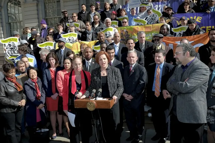 Speaker Christine Quinn announces an agreement on paid sick leave legislation on the steps of City Hall on Friday, March 29, 2013 in New York City. (William Alatriste/ New York City Council)