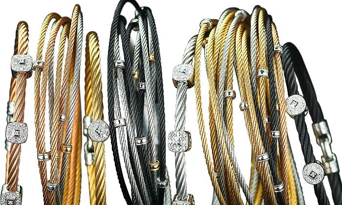 18 kt gold, black, yellow, rose and grey stainless steel diamond stackable bangles and Modern Cable Mix bangles. Price range from $325 - $795 (Courtesy of Charriol)
