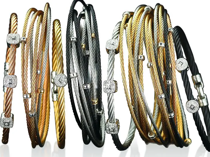 18 kt gold, black, yellow, rose and grey stainless steel diamond stackable bangles and Modern Cable Mix bangles. Price range from $325 - $795 (Courtesy of Charriol)