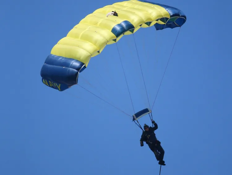 A NAVY Seal parachurtes down before the Kansas City Chiefs NFL game against the Buffalo Bills at Ralph Wilson Stadium on Sept. 16, 2012 in Orchard Park, New York. (Tom Szczerbowski/Getty Images)