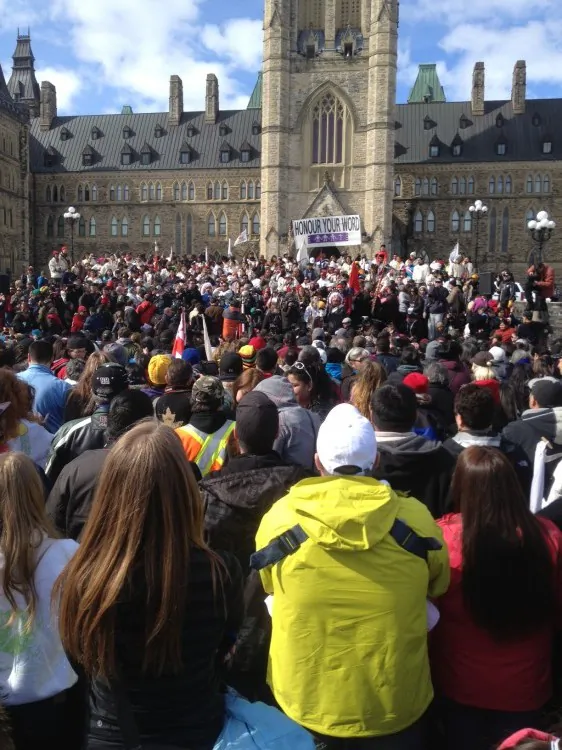 Hundreds of supporters gather on Parliament Hill to welcome the Journey of Nishiyuu walkers—7 young Cree men who trekked 1,600km from their remote village to Ottawa to call attention to aboriginal issues. (Jode Kechego)
