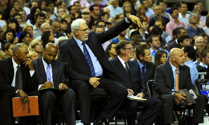 Los Angeles Lakers' coach Phil Jackson (C) gestures during a friendly match against Barcelona on October 7, 2010 at Palau Sant Jordi in Barcelona.  (Luis Gene/AFP/Getty Images)