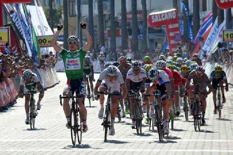 André Greipel of Lotto-Belisol, in the green points leader’s jersey crosses the finish line to win Stage Four of the 2013 Presidential Tour of Turkey in Marmaris on April 24. (tourofturkey.org)