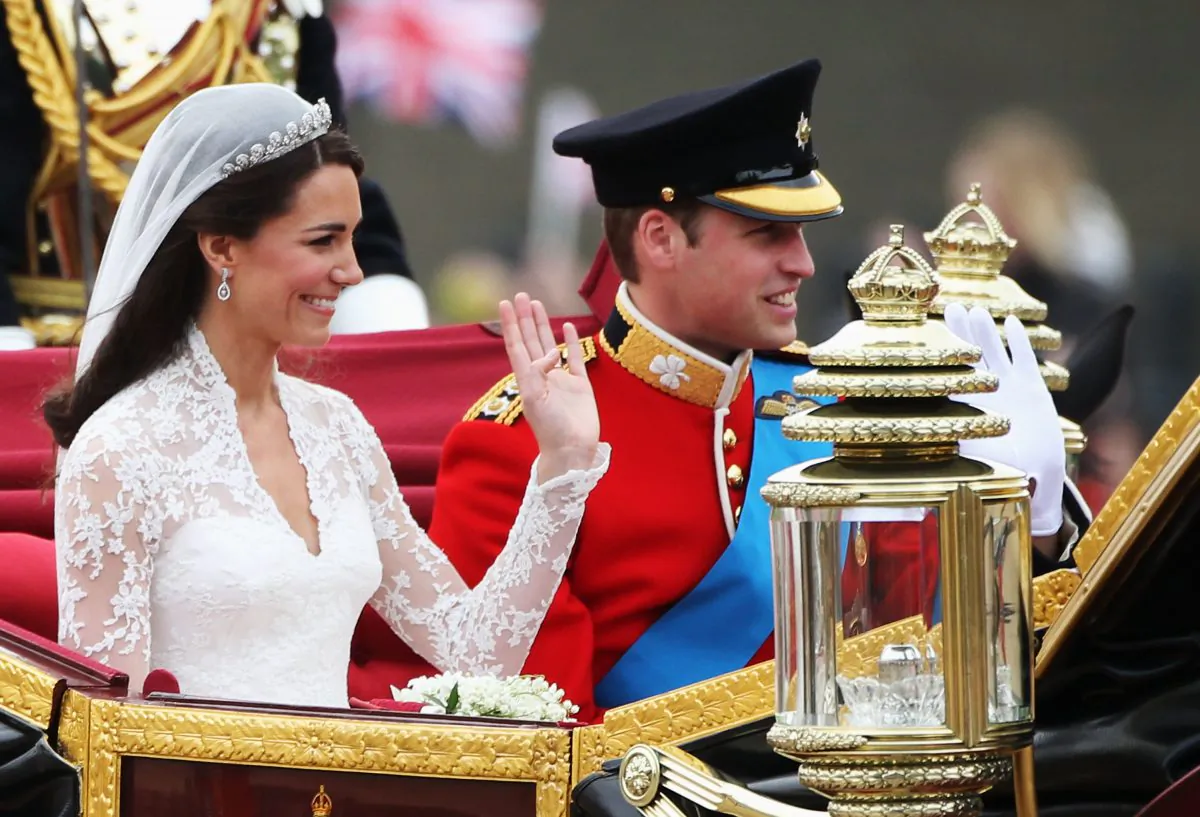 Their Royal Highnesses Prince William, Duke of Cambridge and Catherine, Duchess of Cambridge journey by carriage procession to Buckingham Palace following their marriage at Westminster Abbey on April 29, 2011 in London, England. (Warren Little/Getty Images)