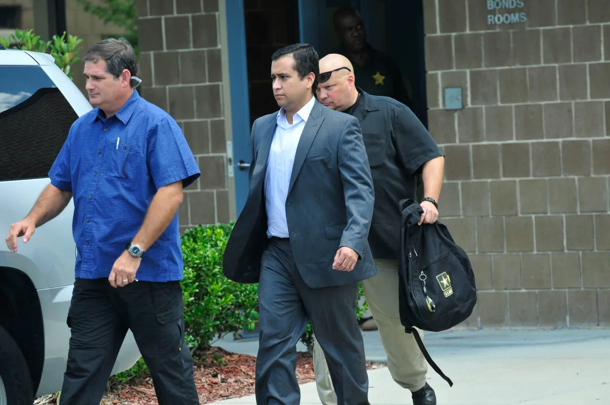 George Zimmerman (C) leaves Seminole County Jail after posting a million dollar bond July 6, 2012 in Sanford, Florida. His mother published a letter online on the one-year anniversary of his arrest. (Roberto Gonzalez/Getty Images)