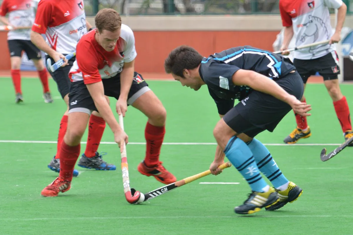 James Kenyon-Brown of Valley-A and Yan Adams of HKGFC-A vie for the ball in their Holland Cup Quarter Final clash at the HKFC ground on Sunday April 7. HKFC-A came away winners 7-2 in this Derby tie to move them forward to the Semi-finals on April 21 at Kings Park where they will play the winners of the match between Punjab-A and Shaheen-A to be played on Sunday April 14. (Bill Cox/The Epoch Times)