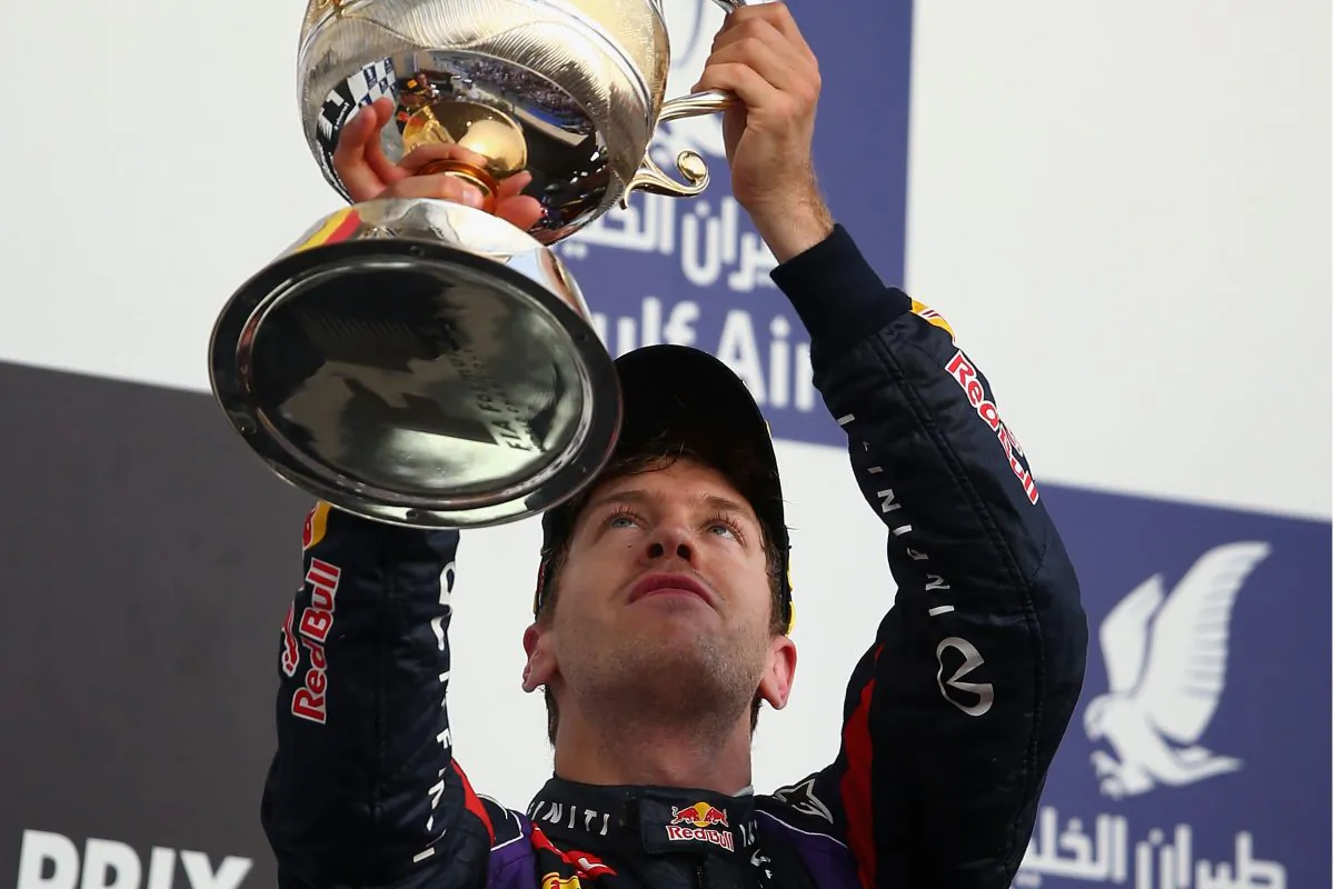 Sebastian Vettel celebrates on the podium after winning the Bahrain Formula One Grand Prix on April 21. (Clive Mason/Getty Images)