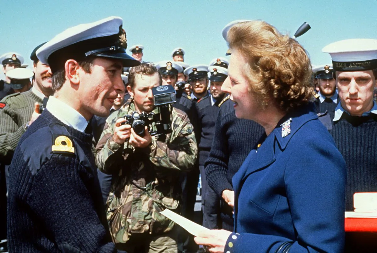 British Prime Minister Margaret Thatcher meets personnel aboard the HMS Antrim on Jan. 8, 1983, during her five-day visit to the Falkland Islands. (Sven Nackstrand/AFP/Getty Images)