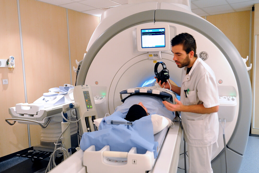 A patient prepares to undergo an MRI at the Oscar Lambret Center in Lille, northern France, a regional medical unit specializing in cancer treatment, on Feb. 6, 2013. (Philippe Huguen/AFP/Getty Images)