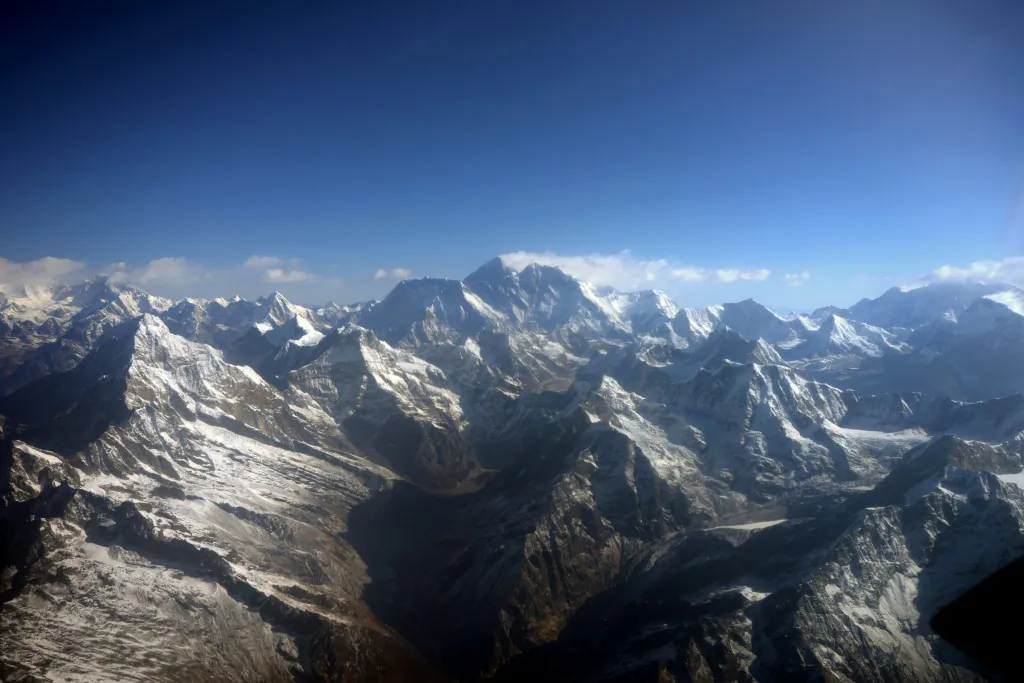 This photograph taken from an aircraft shows an aerial view of Mount Everest (C) and The Himalayan mountain range. (Prakash MathemaAFP/Getty Images)