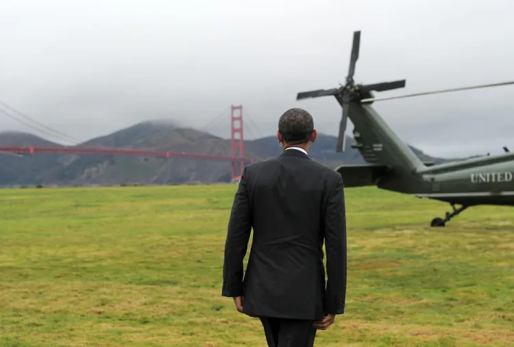 US President Barack Obama boards Marine One helicopter from a field (JEWEL SAMAD/AFP/Getty Images)