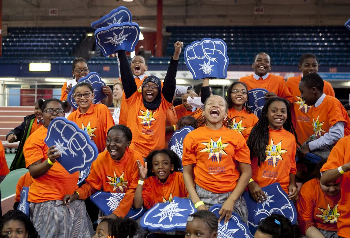 About 1,500 Success Academy students from 14 public charter schools in the Bronx and Harlem participate in a “Slam the Exam Pep Rally,” at the Washington Heights Armory. (Samira Bouaou/The Epoch Times)