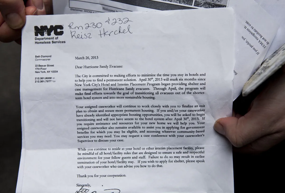 A letter to Hurricane Sandy evacuees issued by the NYC Department of Homeless Services on March 26. The city is attempting to finalize an exit plan for about 50 families who have been living in hotels paid for by the city. (Samira Bouaou/Epoch Times)