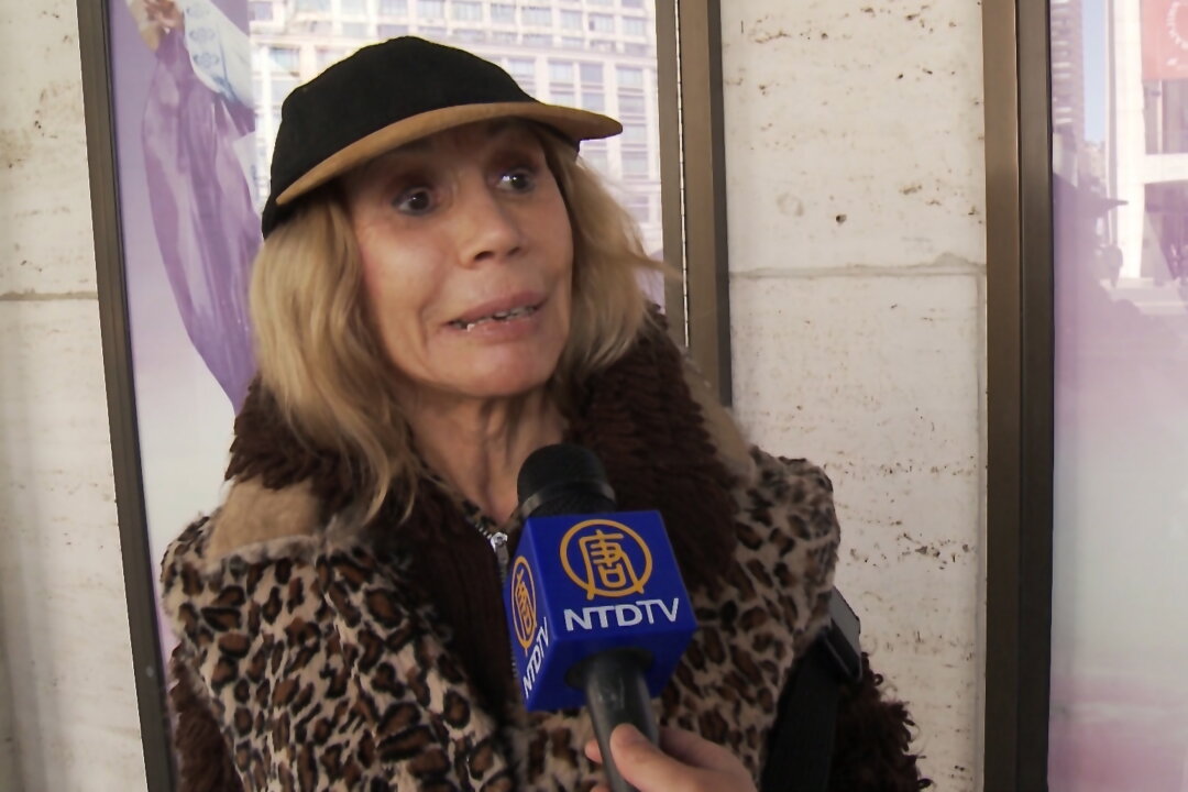 Velma, queen of illusion [as described on her website], enjoys Shen Yun Performing Arts at New York's Lincoln Center, on April 21. (Courtesy of NTD Television)