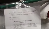 Hong Kong Warns Front Group on Banners