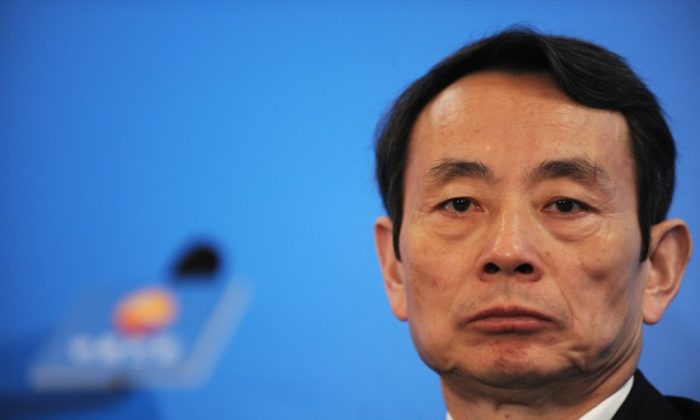 Jiang Jiemin, chairman of PetroChina speaks at the company's 2009 Annual Results announcement in Hong Kong on March 25, 2010. Jiang has encountered political troubles in a corruption investigation recently. (Mike Clarke/AFP/Getty Images)