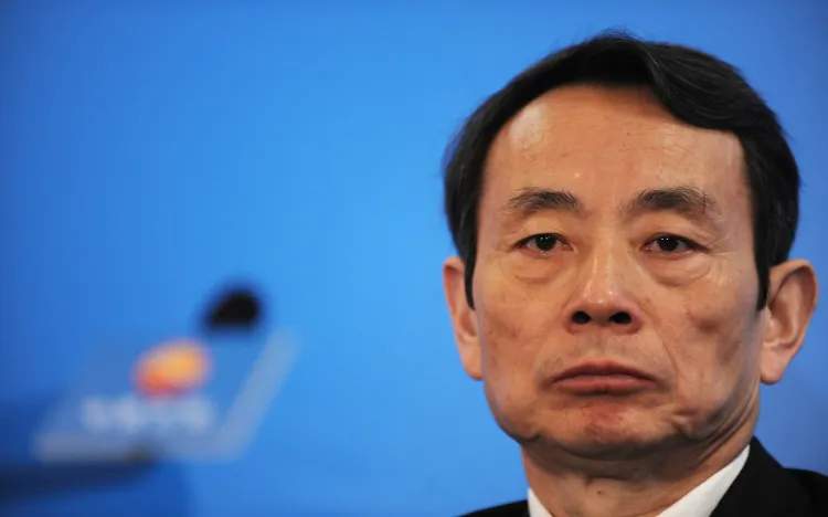 Jiang Jiemin, chairman of PetroChina speaks at the company's 2009 Annual Results announcement in Hong Kong on March 25, 2010. Jiang has encountered political troubles in a corruption investigation recently. (Mike Clarke/AFP/Getty Images)