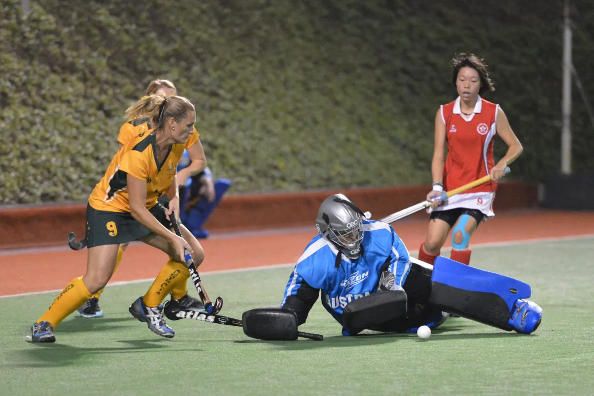 Australian Goalie makes a good stop in their match against HK Women at Kings Park on Friday April 12. (Bill Cox/The Epoch Times) 