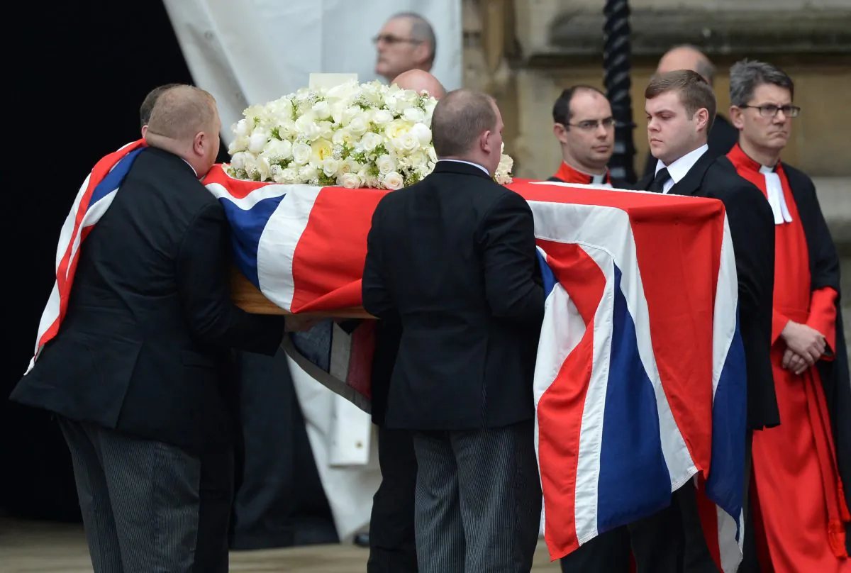 Pallbearers carry the coffin of British former prime minister Margaret Thatcher into the hearse as it leaves the chapel of St Mary Undercroft at the Houses of Parliament  (MIGUEL MEDINA,MIGUEL MEDINA/AFP/Getty Images)