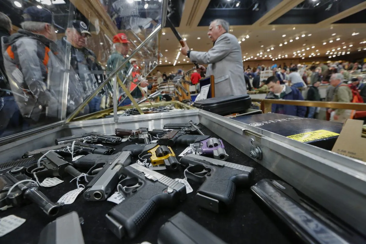 Handguns are displayed at the New York State Arms Collectors Association's annual gun show at the Empire State Plaza Convention Center in Albany, N.Y., on Jan. 26, 2013. (Philip Kamrass/AP Photo)