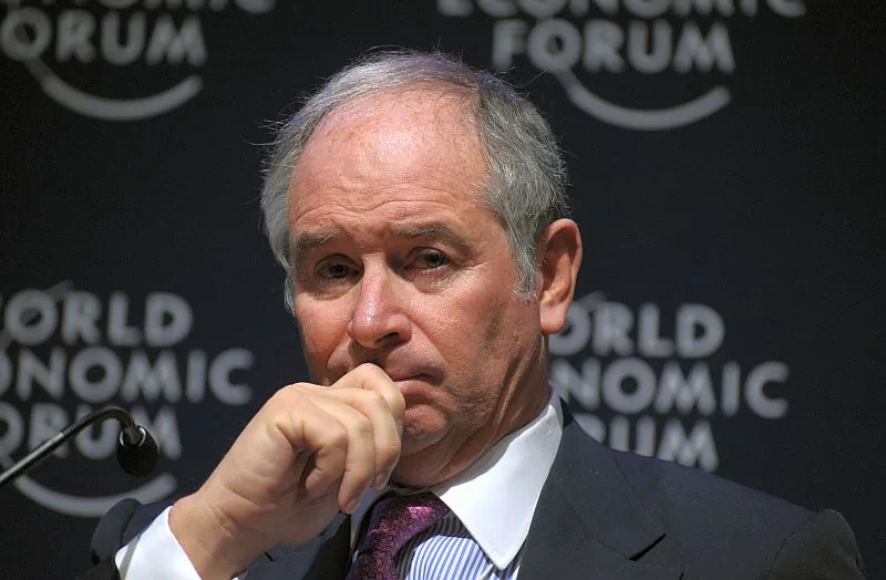 Stephen Schwarzman, chairman and CEO of private equity (PE) firm the Blackstone Group listens during a session on globalization in this file photo from the 2011 World Economic Forum in Davos. Market trends from recent years are forcing PE firms to change the way they do business. (Eric Piermont/AFP/Getty Images)