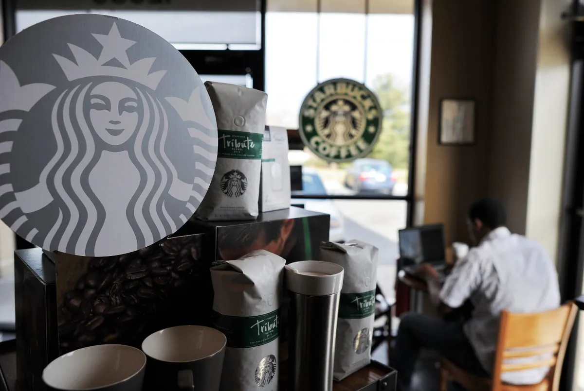 Starbucks cutting prices?: A file photo of a Starbucks café in Silver Spring, Maryland, on March 28, 2013. Starbucks will cut the price of its bagged coffee in May and has already lowered its prices in Indian cafés. (Jewel Samad/AFP/Getty Images)