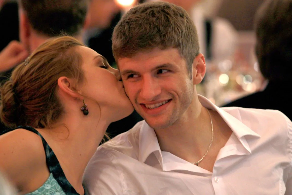 Thomas Mueller of Bayern Muenchen smiles with his wife Lisa Mueller during the Champions League banquett on May 22, 2010 in Madrid, Spain. ( Alexander Hassenstein/Bongarts/Getty Images)