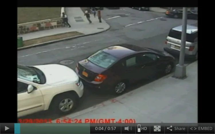 A screenshot from NBC News video footage shows the two apparent abductors on the top part of the screen running. (Screenshot via The Epoch Times)