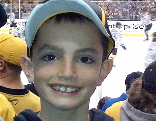 This undated photo provided by Bill Richard shows his son, Martin Richard, in Boston. Martin Richard, 8, was among the at least three people killed in the explosions at the finish line of the Boston Marathon on Monday. (AP Photo/Bill Richard)