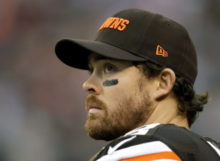 Cleveland Browns quarterback Colt McCoy watches from the sidelines during an NFL football game in Cleveland. (AP Photo/Mark Duncan, File)